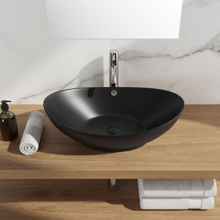 Oval countertop washbasin 60x37 cm in matt black ceramic - Cloe